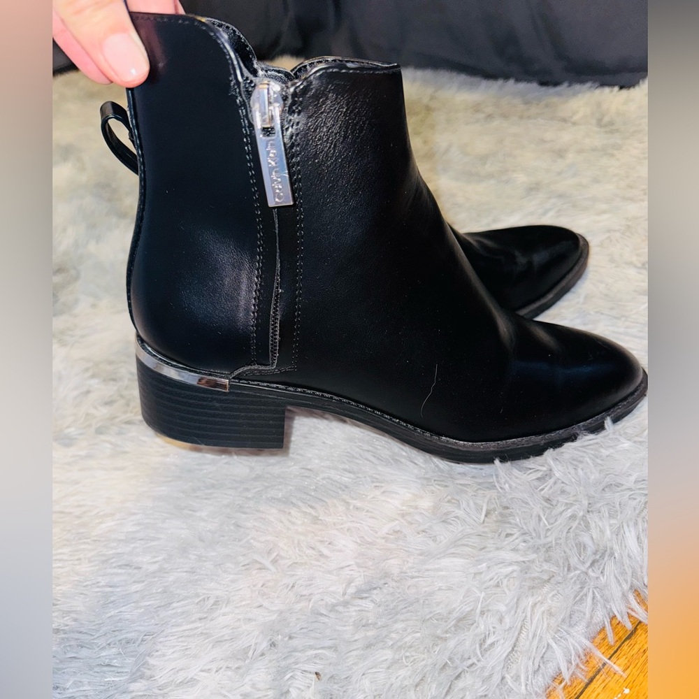Calvin Klein booties. Never used